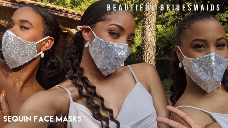 May include: Three people wearing white dresses and silver sequin face masks. The text "BEAUTIFUL BRIDESMAIDS" is at the top of the image and the text "SEQUIN FACE MASKS" is at the bottom of the image.