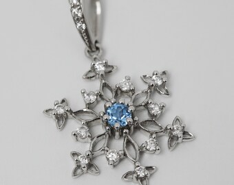 Large Snowflake Pendant: Natural blue and white topaz pendant and 16’ chain, silver 925