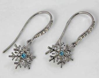 Snowflake Earrings: Natural blue and white topaz gemstones with stone-set ear wire closure, silver 925