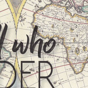 May include: A vintage world map with the text "all who wander" printed over it in black. The map is in a cream color with brown, red, and yellow accents.