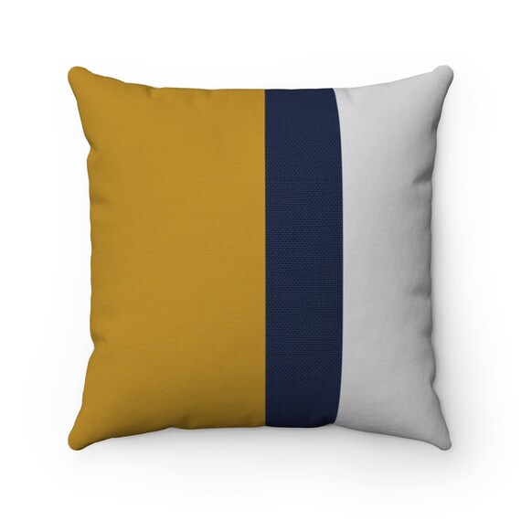 mustard and navy pillows