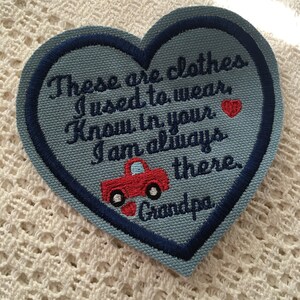 May include: A blue heart-shaped patch with embroidered text that reads "These are clothes I used to wear, Know in your I am always there. Grandpa". A red truck and a red heart are also embroidered on the patch.