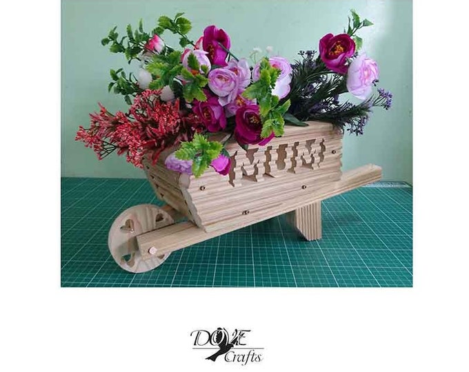 Wheelbarrow Planter Hand Crafted, Carving