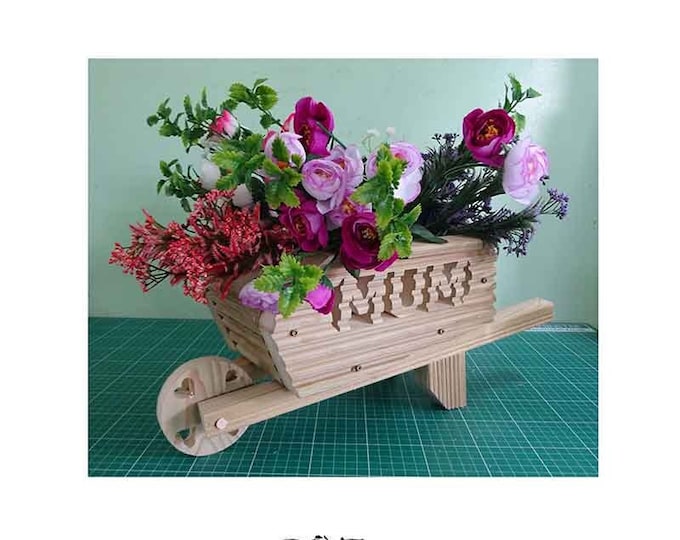 Wheelbarrow Planter Hand Crafted, Carving