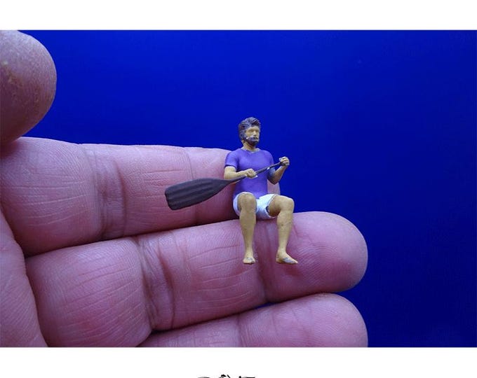 Just Man Rafting on River Figures, (Boats are just for illustrative reason)
