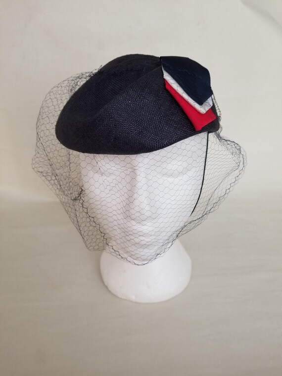 small hat with netting