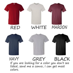 May include: Six t-shirts in different colors: red, white, maroon, navy, grey, and black. The text below the shirts reads: "If you are looking for a color you don't see listed, send me a convo, I can get most colors."