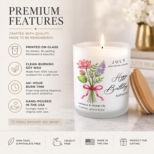May include: A lit white soy wax candle in a glass jar with a wooden lid. The jar features a floral design with the text "Happy Birthday Katherine" and "July birth flower candle". The candle is hand-poured in the USA.