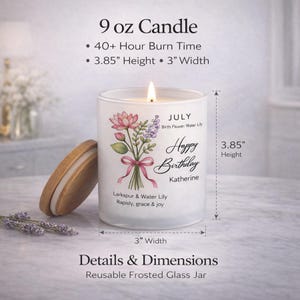 May include: A white frosted glass candle with a wooden lid. The candle has a floral design with the text "Happy Birthday Katherine" and "July". The candle is 3.85 inches high and 3 inches wide.