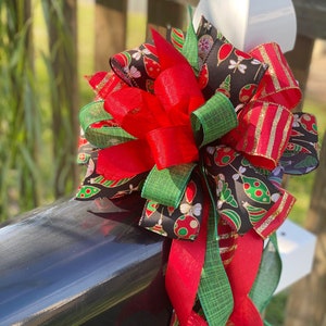 Christmas Bow in Red, Black, and Green Featuring Colorful Ornament Ribbon. Perfect for Mailbox, Door, and Wreath.
