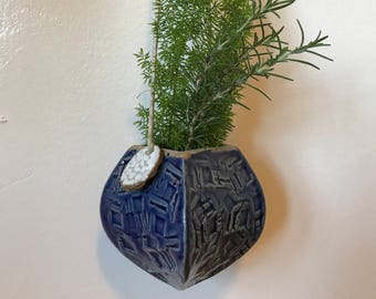 Textured blue ceramic hanging planter vase