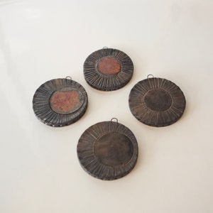 Brutalist stoneware ornaments.