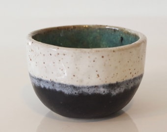 Stoneware ceramic pinch pot.