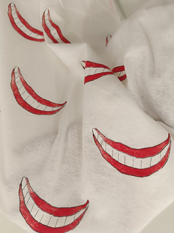 White cotton jersey fabric with motif