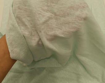 Lichtgroene 100% linnen gebreide stof, jerseymateriaal