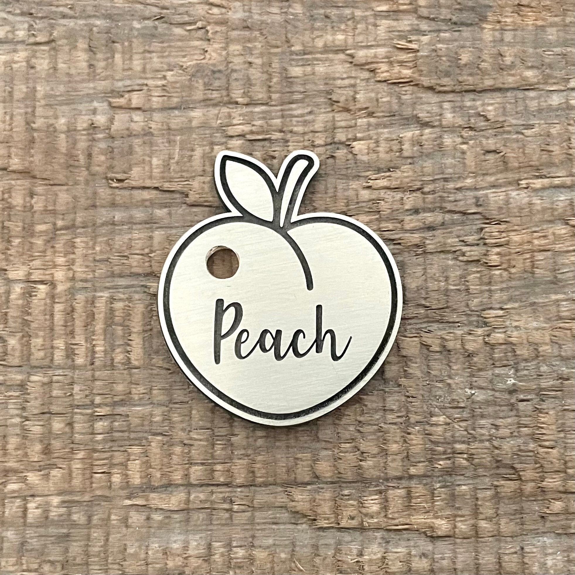 Peach shaped dog tag top