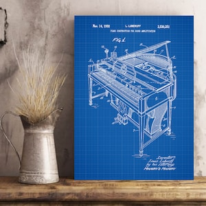 May include: A blueprint style illustration of a piano construction for sound amplification, patent number 2,530,251, filed November 14, 1950, by Louis Luberooff. The patent drawing shows a detailed view of the piano with its internal components.