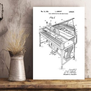 May include: Black and white line drawing of a piano with a sound amplification system. The patent drawing is titled "Piano Construction for Sound Amplification" and includes the patent number 2,530,251 and the date November 14, 1950.