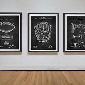 May include: Three black and white framed prints of vintage sports equipment patent drawings. The left print shows a football, the middle print shows a baseball glove, and the right print shows a basketball hoop.