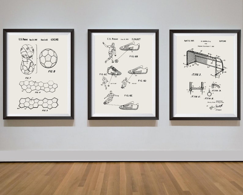 May include: Three black framed prints of vintage patent drawings for a football, football boots, and a football goal. The drawings are in black and white and include text and diagrams.