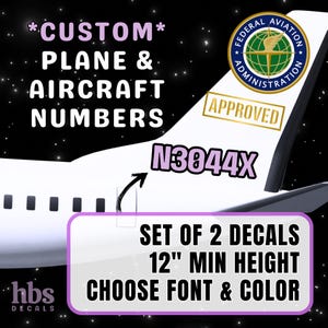 May include: A white airplane tail with a black stripe and a Federal Aviation Administration (FAA) approved sticker. The tail has a large pink number "N3044X" on it. The image also includes the text "*CUSTOM* PLANE & AIRCRAFT NUMBERS SET OF 2 DECALS 12" MIN HEIGHT CHOOSE FONT & COLOR hbs DECALS".