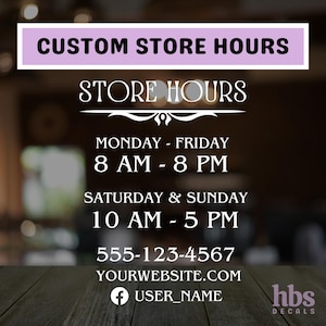 May include: A purple and white sign with the text "CUSTOM STORE HOURS" and "STORE HOURS" in a decorative font. The sign lists the store hours: Monday-Friday 8 AM-8 PM, Saturday & Sunday 10 AM-5 PM. The sign also includes the phone number 555-123-4567, the website YOURWEBSITE.COM, and a Facebook icon with the text "USER_NAME". The sign is on a wooden surface with a blurred background.