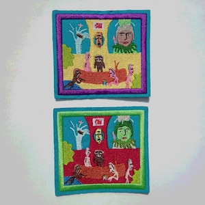 May include: Two embroidered patches with a colorful, whimsical design. The patches feature a group of figures with a red, yellow, and green background. The text "福" is visible on both patches.
