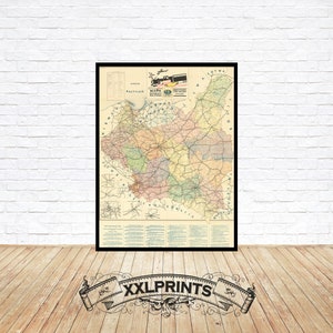 Puede incluir: Un mapa vintage de los Estados Bálticos, impreso en blanco y negro con bordes de colores. El mapa muestra los países de Letonia, Lituania y Estonia. El mapa está titulado "Karte des Baltischen Gebietes" e incluye una pequeña ilustración de un tren.