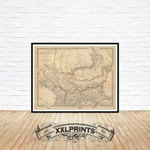 Puede incluir: Un mapa vintage del Imperio austrohúngaro, impreso en blanco y negro sobre papel crema. El mapa muestra las fronteras del imperio, las principales ciudades y los ríos. El título del mapa es "Karte des Osterreichischen Kaiserthums und des Konigreichs Ungarn" y la fecha es 1869.