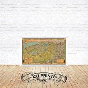 Può includere: Una mappa vintage della baia di Chesapeake, stampata in tonalità di verde, blu e marrone. La mappa mostra le vie navigabili, le isole e le città della regione. Il titolo della mappa è "Chesapeake Bay and Tributaries" e la data di copyright è 1908.