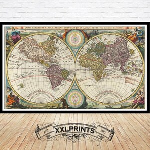 May include: Framed vintage world map print with a black border. The map features detailed illustrations in shades of yellow, green, and purple. The text "XXLPRINTS" is displayed at the bottom. The map is set against a white brick wall and wooden floor.
