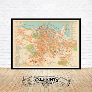 May include: A vintage map of Malmo, Sweden, printed in black, red, and blue on a cream-colored background. The map shows the city's streets, parks, and waterways. The title "Malmo" is printed in the upper left corner.