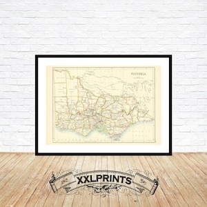 May include: A vintage map of Victoria, Australia, printed in black and white with yellow accents. The map shows the state's borders, major cities, and towns. The title "Victoria" is printed at the top of the map.
