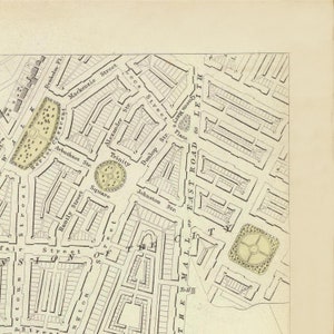 May include: A black and white map of a city with street names and a few parks. The map is titled "The Mall of East Road to Leith".