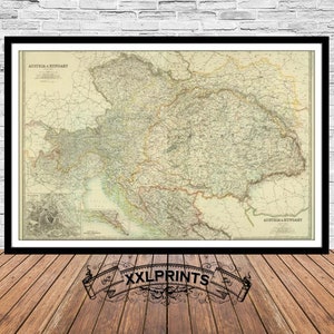 May include: A vintage map of Austria-Hungary, showing the borders of the Austro-Hungarian Empire in the early 20th century. The map is printed in black and white on a cream-colored background.