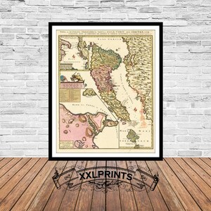 May include: An antique map of the California coast, printed in black, brown, green, and pink. The map shows the coastline of California, including the San Francisco Bay area, and the surrounding islands. The map is titled "Nova et Accurata Chorographica Tabula Novae Californiae, Erste und Zweite Auflage, 1770".