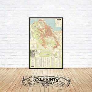 Puede incluir: Mapa vintage de Haifa, Israel, impreso en papel color crema con marco negro. El mapa muestra las calles, los puntos de referencia y los barrios de la ciudad. El mapa está titulado "Haifa" en texto negro en la parte superior.