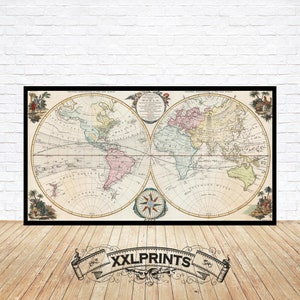 Op de afbeelding: Een antieke wereldkaartprint in een zwart frame. De kaart is in vintage stijl met een lichtbeige achtergrond en kleurrijke continenten. De kaart is getiteld "A New and Accurate Map of the World" en bevat een kompasroos.