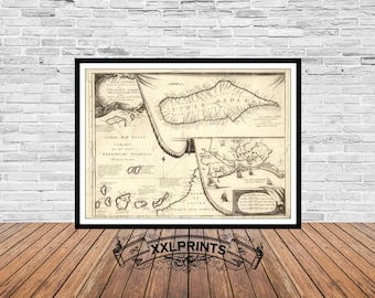 May include: An antique map of the island of Madeira, Portugal, with surrounding islands. The map is printed in black and white on a cream-colored paper. The map is framed in a black frame.