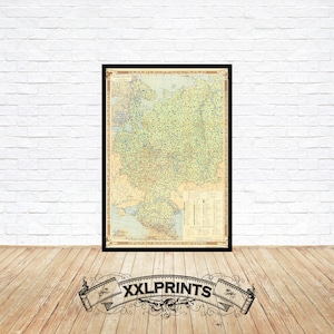 May include: A vintage map of the Soviet Union in a black frame, printed on cream-coloured paper with green and brown details. The map is titled "Soviet Union" and includes a legend and scale.