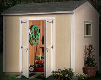 May include: A beige wooden shed with a white door and a small window. The door is open and the inside of the shed is visible. There is a green garden hose hanging on the wall and a lawnmower inside the shed.