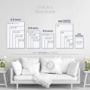 May include: Wall art size guide with dimensions in inches. Displays 2:3, 3:4, and 4:5 ratios, along with ISO standard paper sizes and sizes for printing. The sofa below is 90 inches wide. The image is on a white wall.