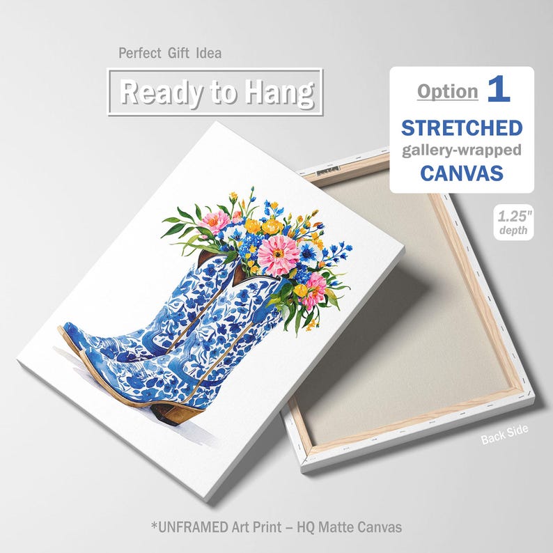 May include: A stretched canvas art print featuring blue and white cowboy boots filled with colorful flowers. The boots have a floral pattern. The canvas is 1.25 inches deep and ready to hang.