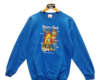 パーカー 90s vintage Donald Duck HOODIE Vintage 90s Disney “donald Duck” Hoodie – Dia Club Knit Wear – M/L