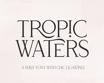May include: A serif font with chic ligatures called "Tropic Waters". The font is displayed in black text on a light pink background.