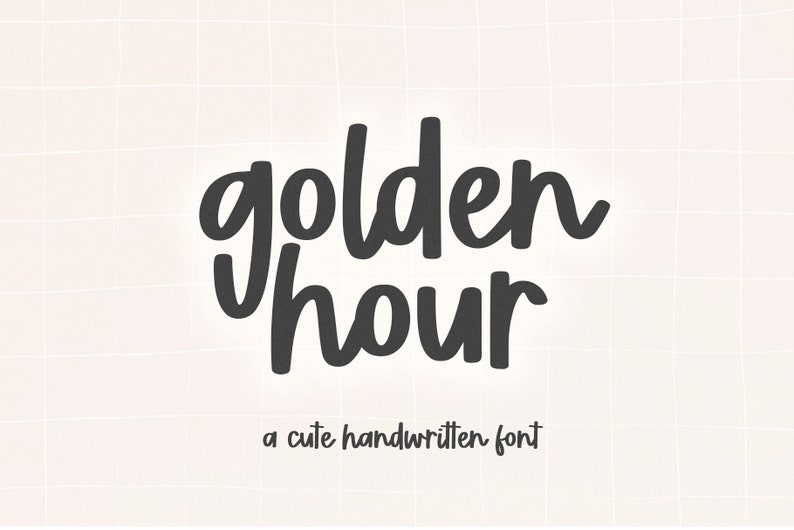 May include: A handwritten font design in black text on a white background. The text reads "golden hour" with the words "a cute handwritten font" below.