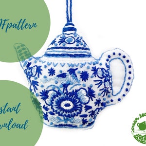 May include: PDF pattern for a blue and white embroidered teapot ornament. The teapot is decorated with floral and bird motifs. The pattern is available for instant download.