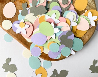 Happy Easter Bunny Confetti. Pastel Easter decorations including flowers, eggs & bunnies. Children's Easter Celebration Party. Easter Décor