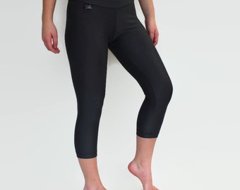 Black cropped leggings, capris, three quarter length lycra leggings