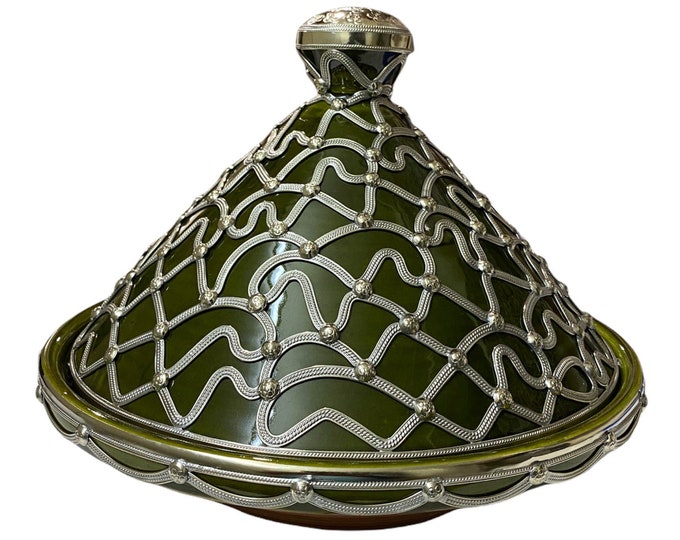 A handmade and hand-painted Moroccan tagine dish, encrusted with maillechort.